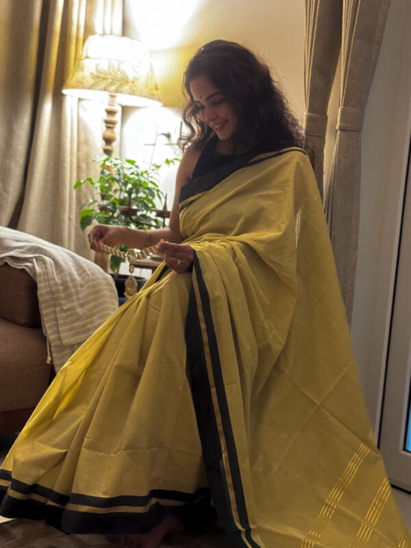 Ochre kasavu saree