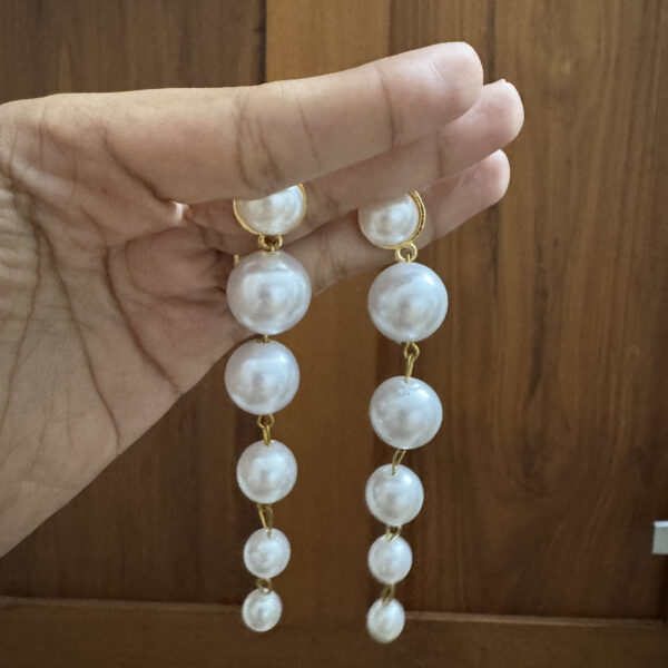 Artificial pearl drops