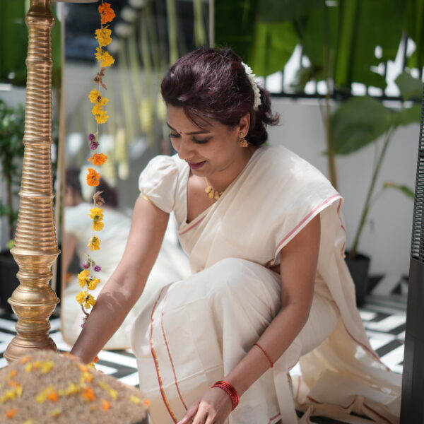 Red kara and golden kasavu set mundu